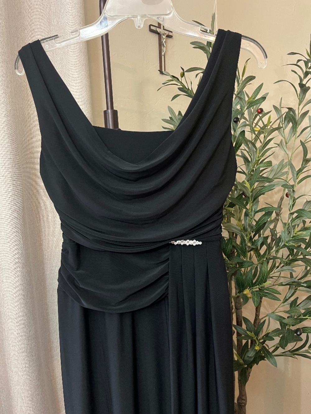 Beautiful Black maxi length gown, rhinestone broach.